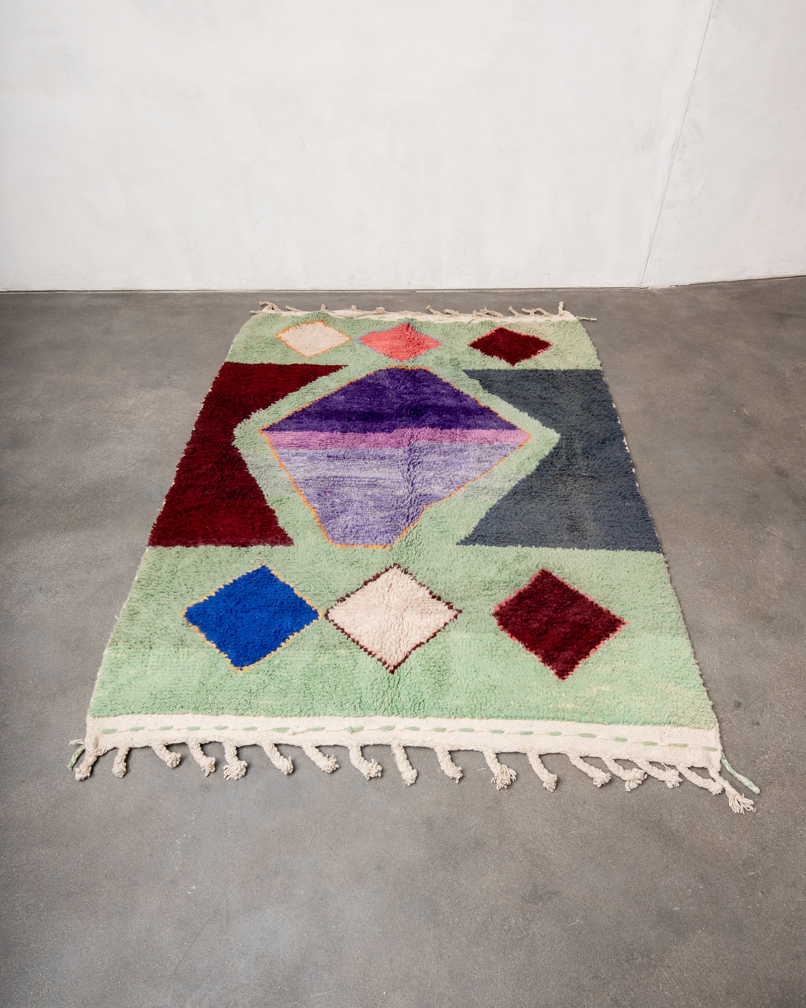 Modern, designer, handcrafted Berber rug from Morocco. Vintage carpet with beautiful colours and patterns and fluffy texture.